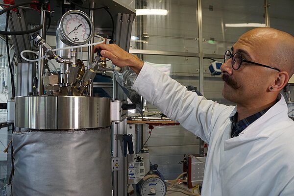 Dr Nader Marzban works with a hydrothermal reactor.