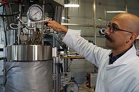 Dr Nader Marzban works with a hydrothermal reactor.